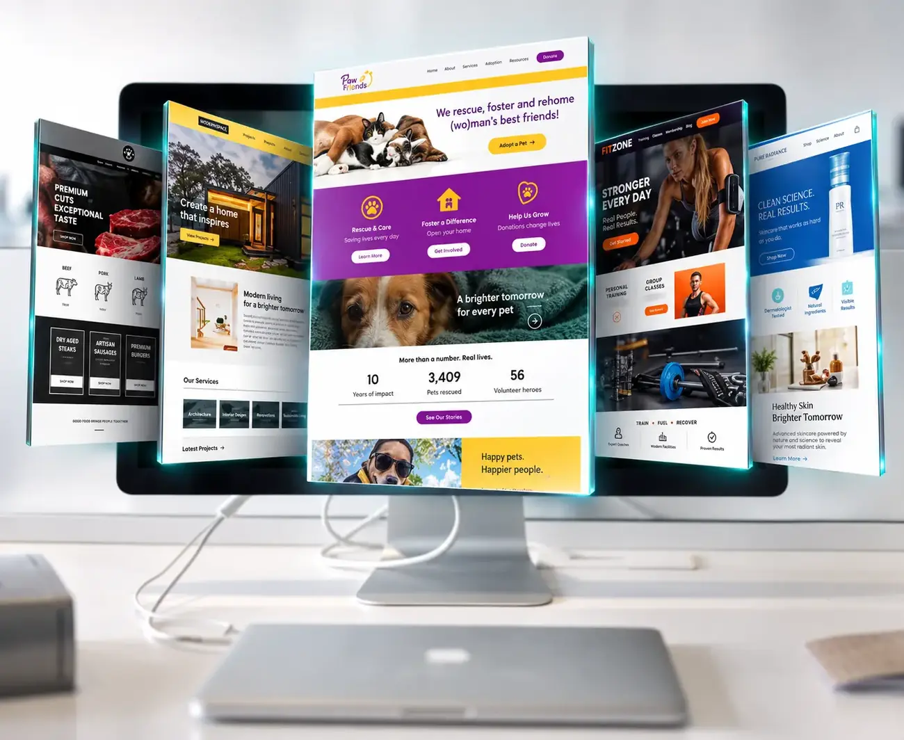 Examples of websites for various industries displayed around a monitor